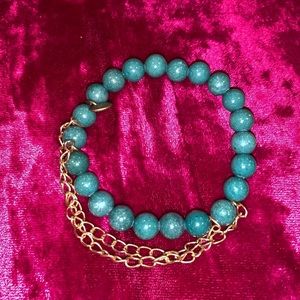 Sundrenchd Green beaded bracelet with gold chain